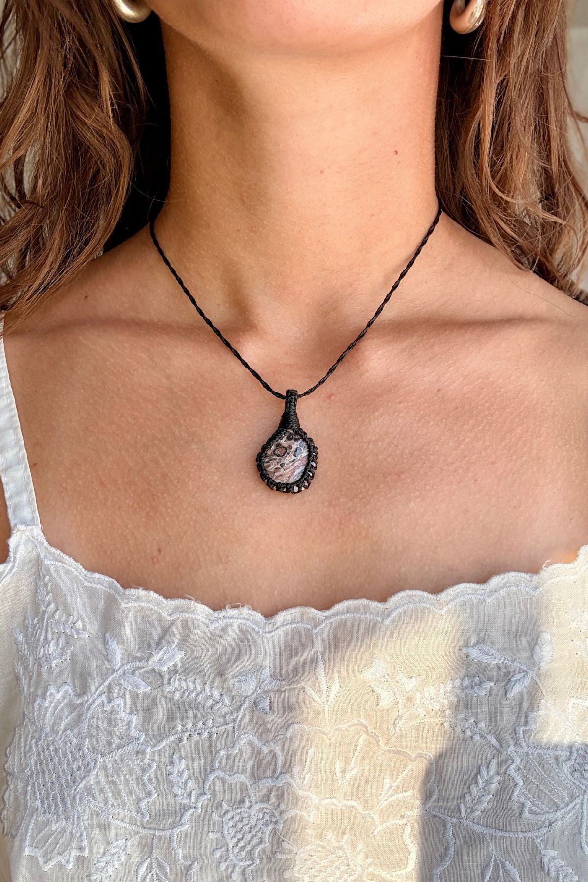 Model wearing a handmade Leopard Jasper macramé necklace, delicate everyday jewelry