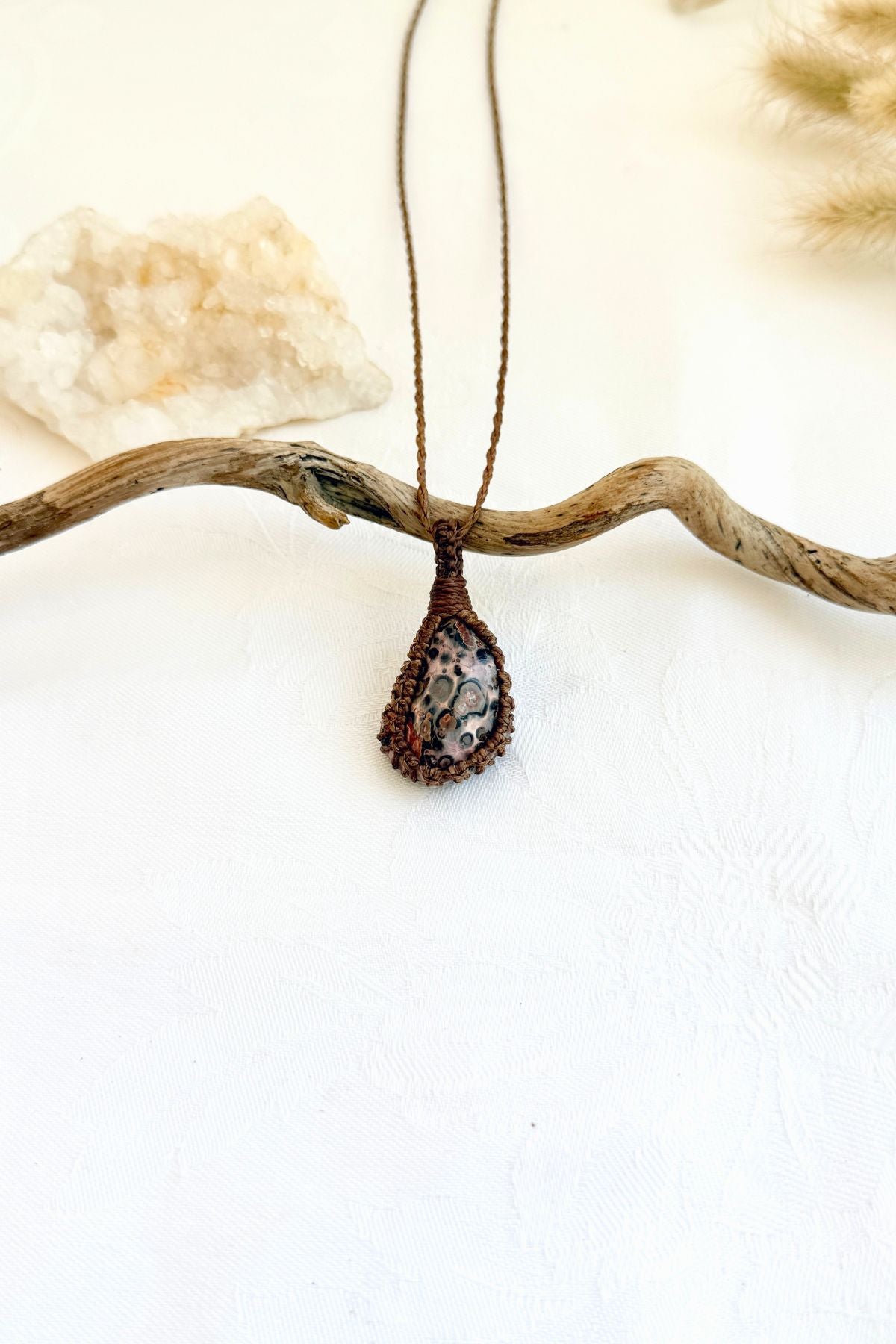 Handmade Leopard Jasper macramé necklace, front view of natural gemstone pendant