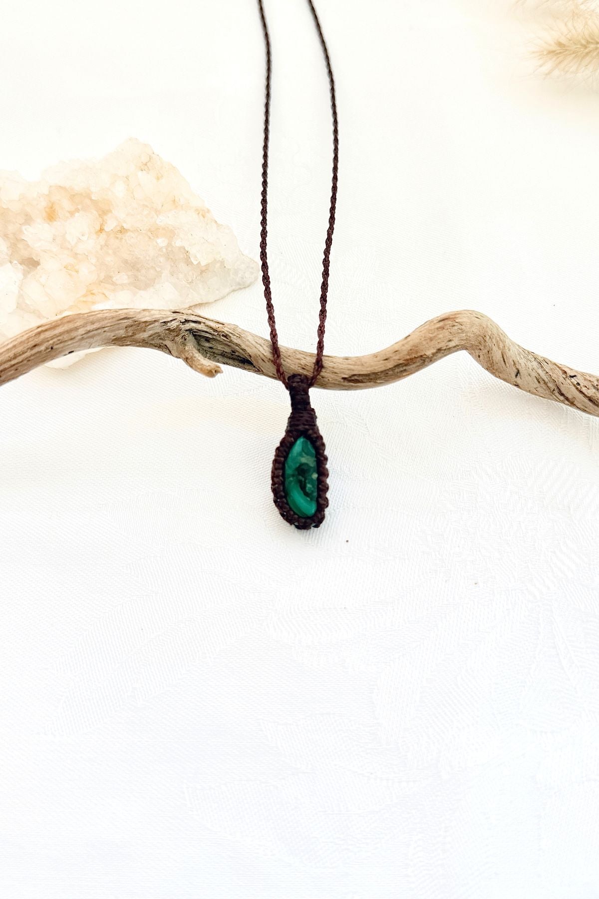 Handmade Malachite macramé necklace, front view of natural gemstone pendant