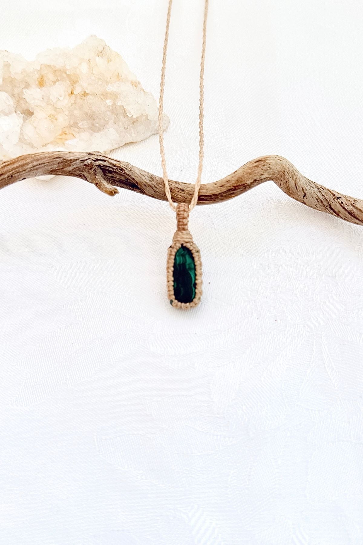 Handmade Malachite macramé necklace, front view of natural gemstone pendant