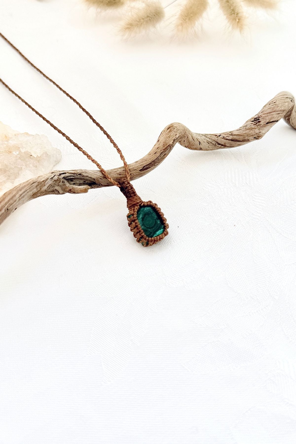 Handmade Malachite macramé necklace, side view showing the gemstone and macramé knotting