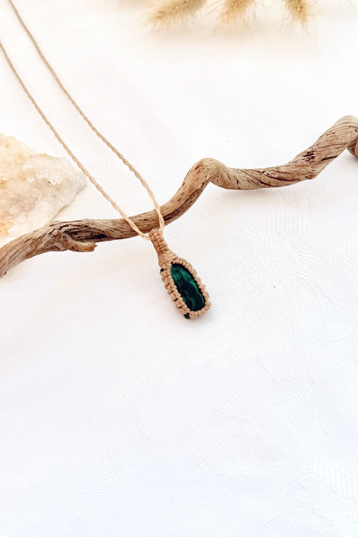 Handmade Malachite macramé necklace, side view showing the gemstone and macramé knotting