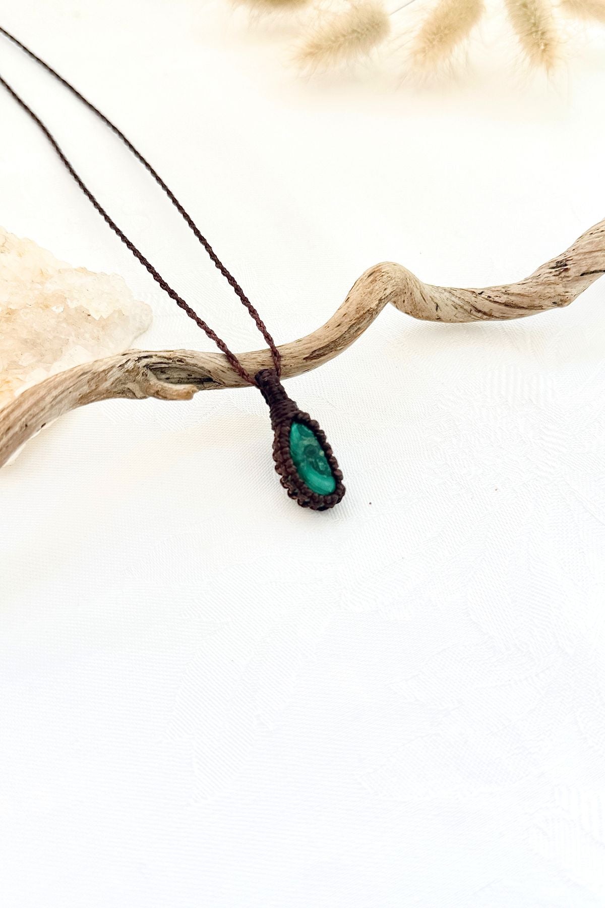 Handmade Malachite macramé necklace, side view showing the gemstone and macramé knotting