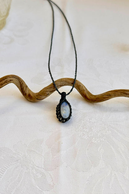 Handmade Moonstone Macrame necklace featuring a high-quality gemstone, laid flat to showcase its delicate everyday-wear design from the Essence collection.