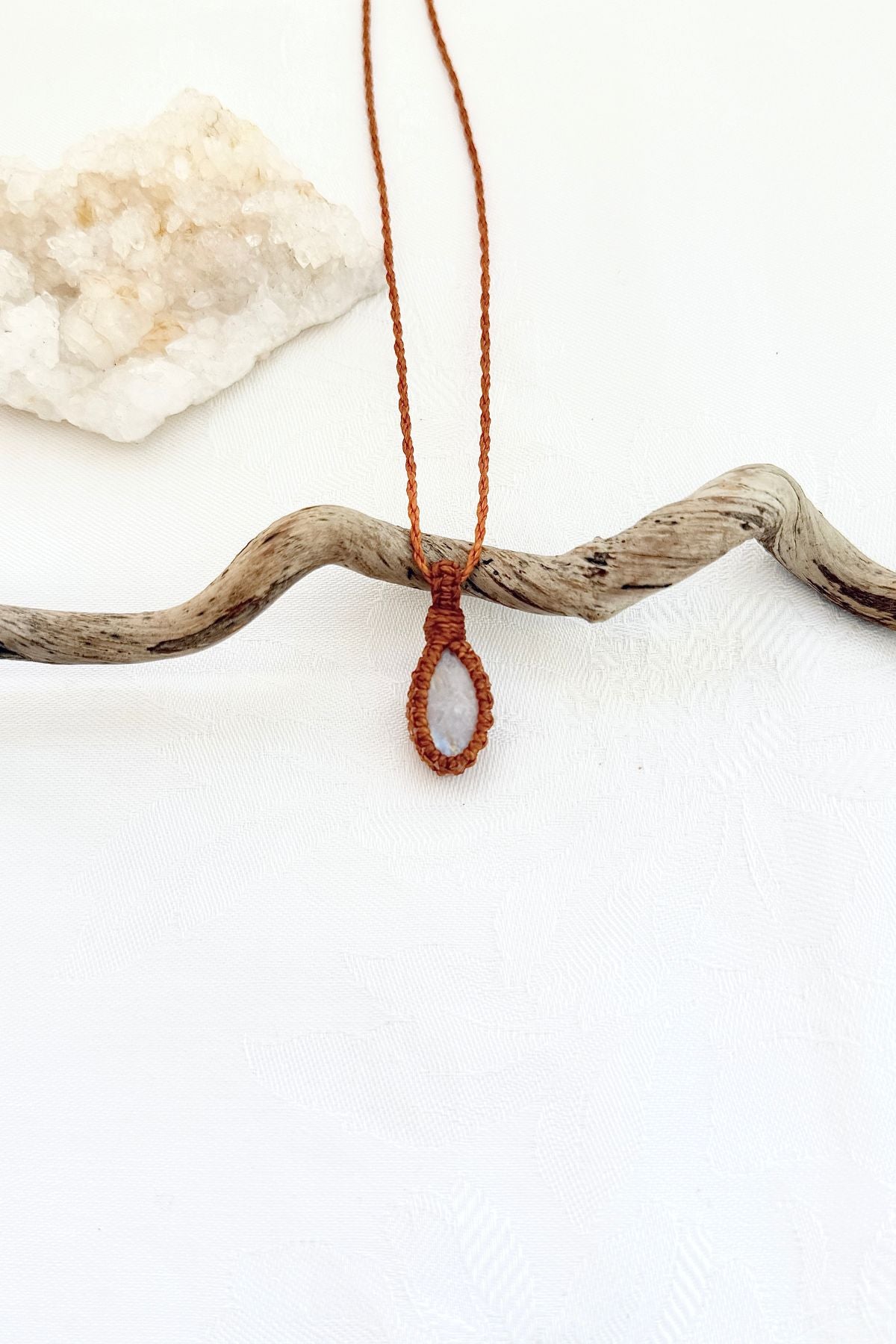 Handmade Moonstone macramé necklace, front view of natural gemstone pendant