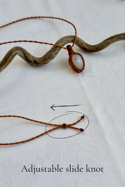 Close-up of the adjustable sliding knot on the Moonstone Macrame necklace, allowing for an easy and customizable fit for any wearer.