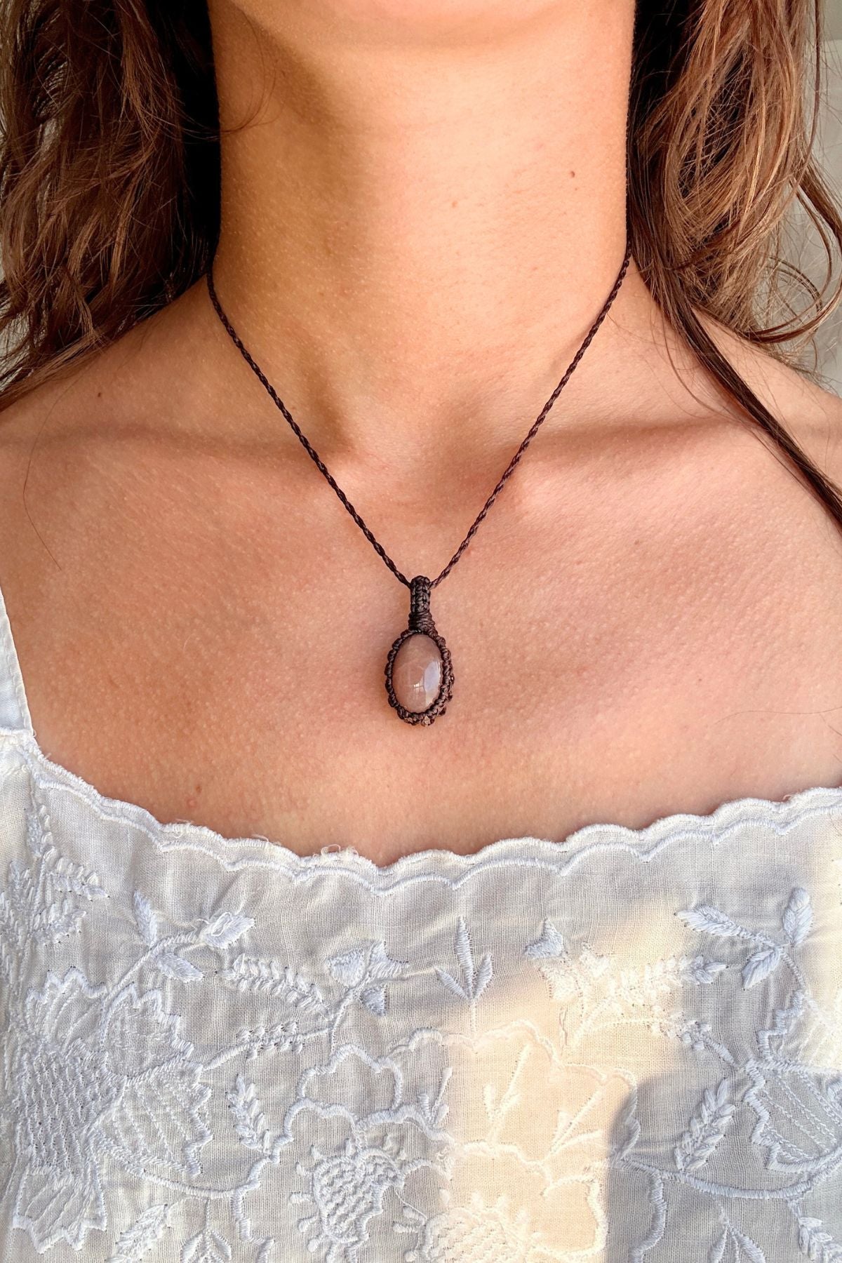 Model wearing a handmade Peach Moonstone macramé necklace, delicate everyday jewelry