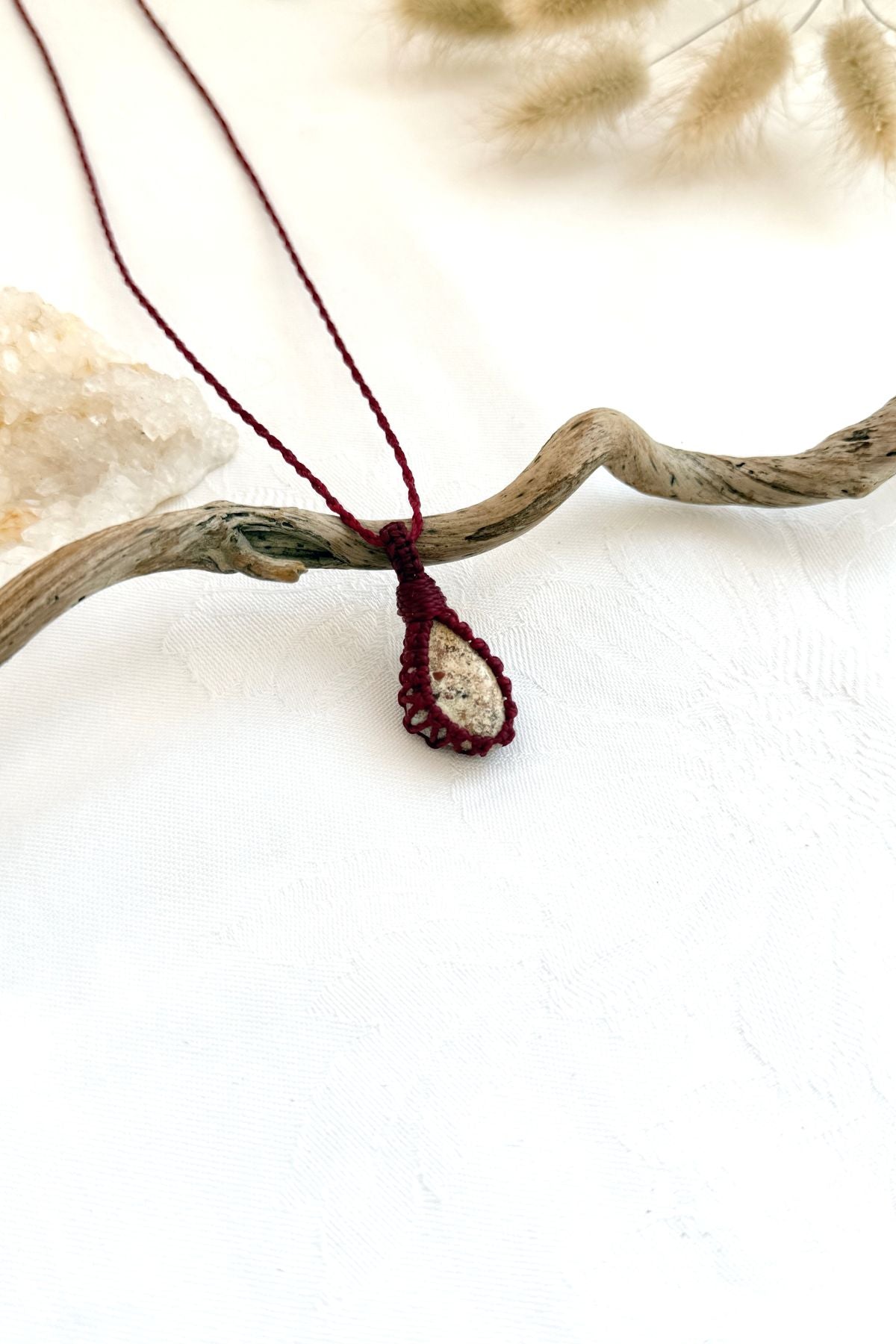 Handmade Picture Jasper macramé necklace, side view showing the gemstone and macramé knotting