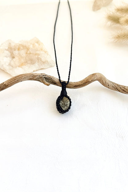 Handmade Pyrite macramé necklace, side view showing the gemstone and macramé knotting