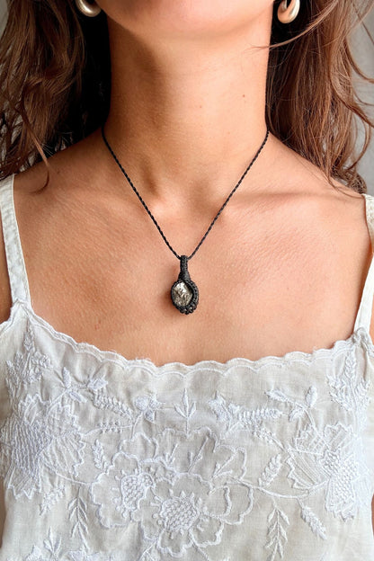 Model wearing a handmade Pyrite macramé necklace, delicate everyday jewelry