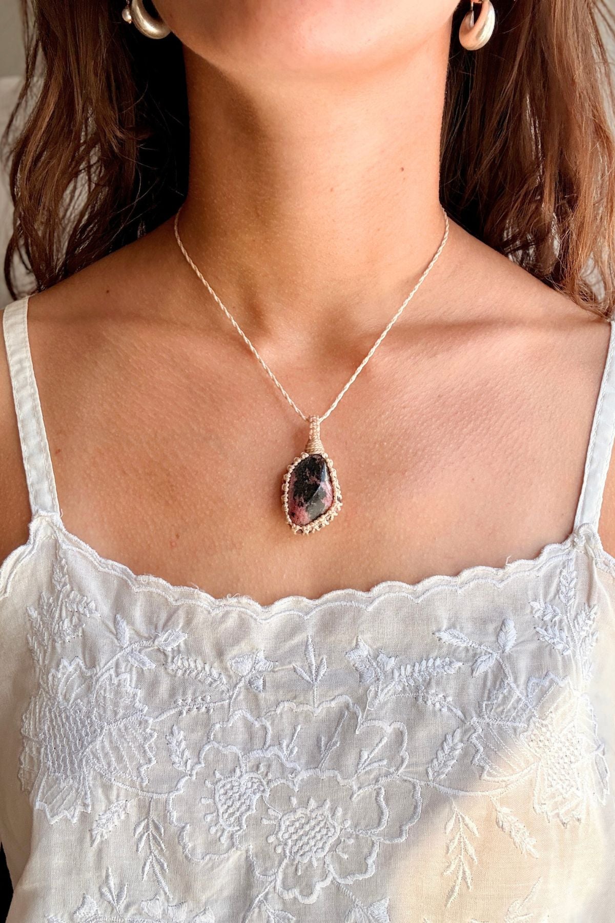 Model wearing a handmade Rhodonite macramé necklace, delicate everyday jewelry