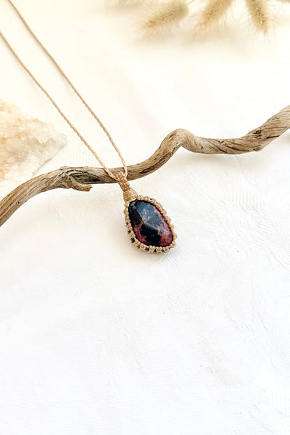 Handmade Rhodonite macramé necklace, side view showing the gemstone and macramé knotting