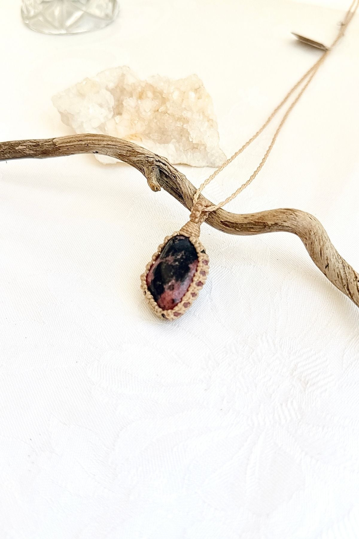 Handmade Rhodonite macramé necklace, from another side view showing the gemstone and macramé knotting