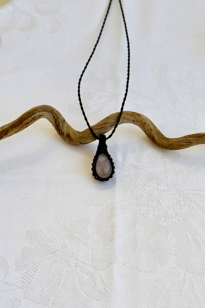 Handmade Rose Quartz Macrame necklace featuring a high-quality gemstone, laid flat to showcase its delicate everyday-wear design from the Essence collection.