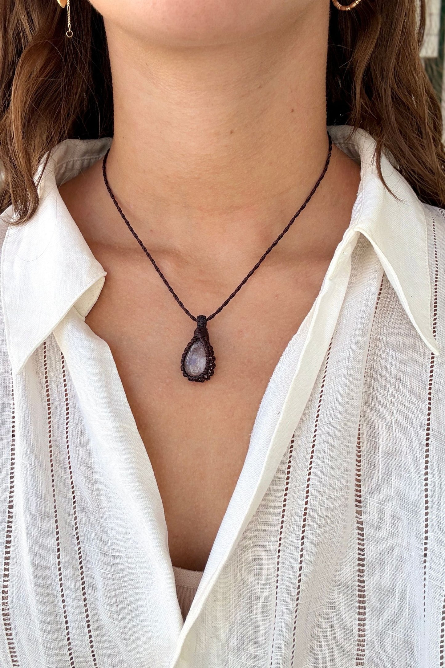 Model wearing a delicate handmade Rose Quartz macrame necklace with a brown cord, perfect for everyday wear.