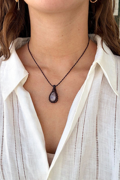 Model wearing a delicate handmade Rose Quartz macrame necklace with a brown cord, perfect for everyday wear.