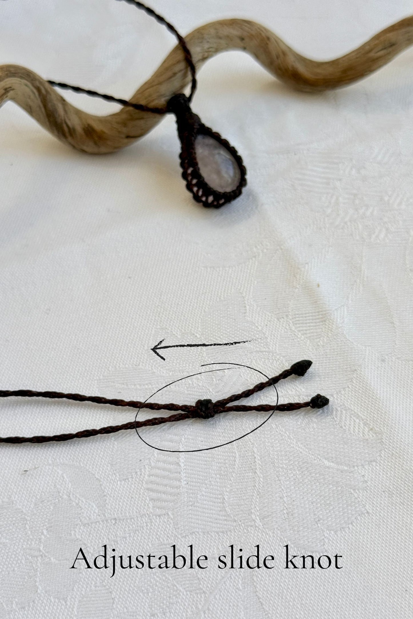 Close-up of the adjustable sliding knot on the Rose Quartz Macrame necklace, allowing for an easy and customizable fit for any wearer.