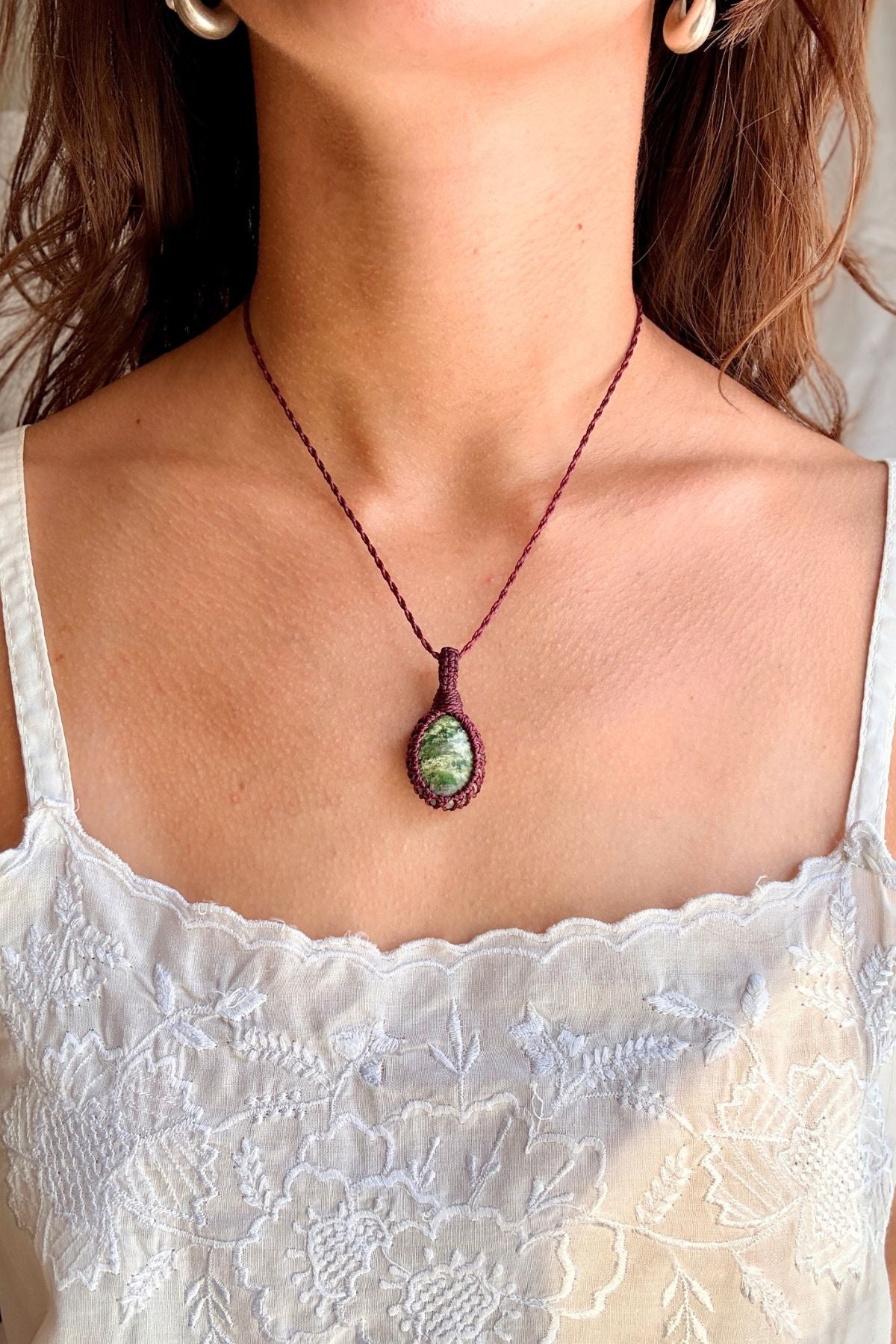 Model wearing a handmade Ruby Fuchsite macramé necklace, delicate everyday jewelry