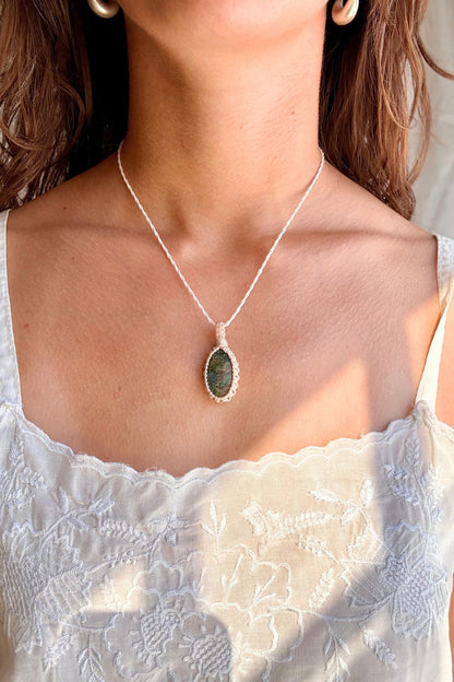 Model wearing a handmade Ruby Fuchsite macramé necklace, delicate everyday jewelry