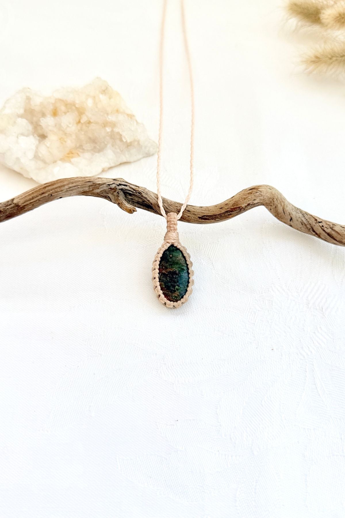 Handmade Ruby Fuchsite macramé necklace, front view of natural gemstone pendant