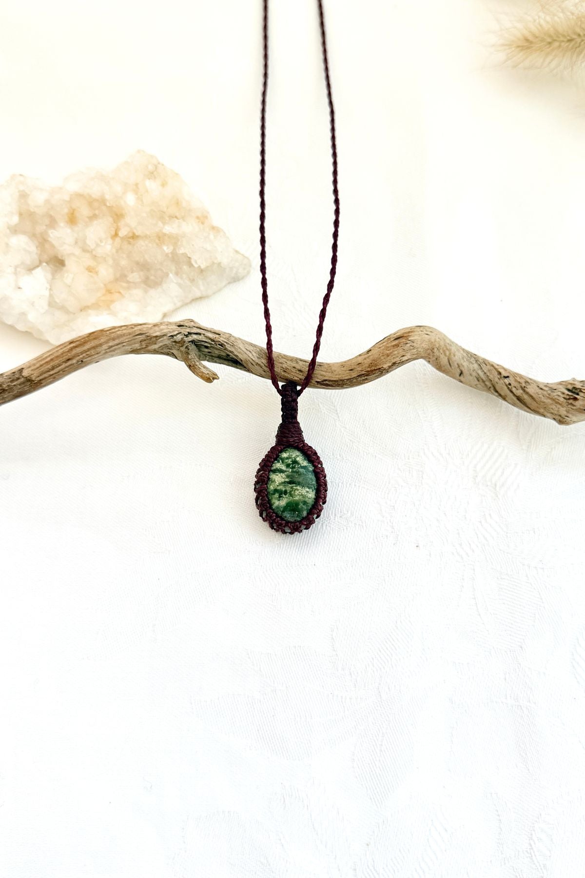Handmade Ruby Fuchsite macramé necklace, front view of natural gemstone pendant