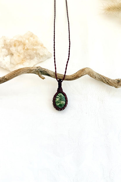 Handmade Ruby Fuchsite macramé necklace, front view of natural gemstone pendant
