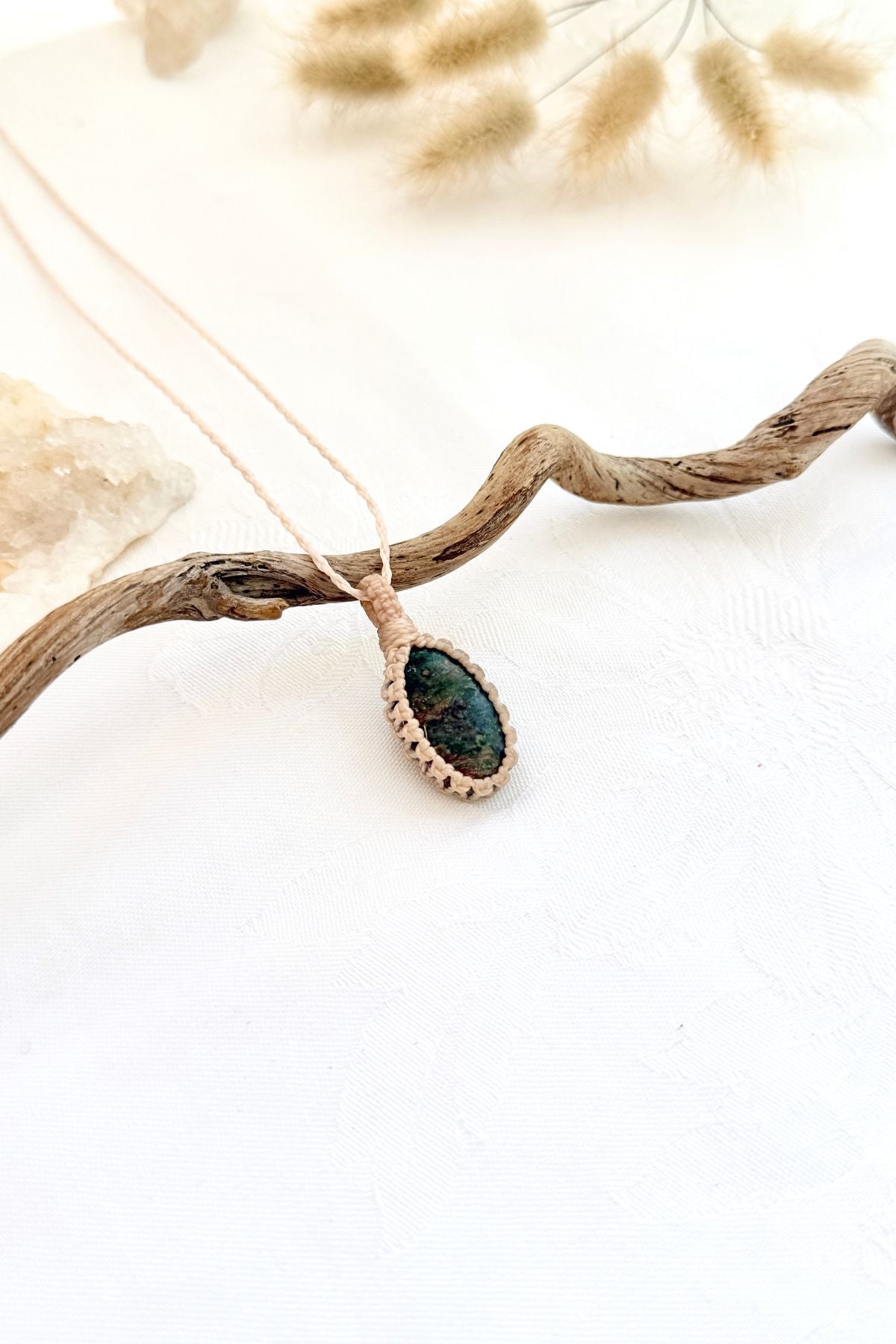 Handmade Ruby Fuchsite macramé necklace, side view showing the gemstone and macramé knotting