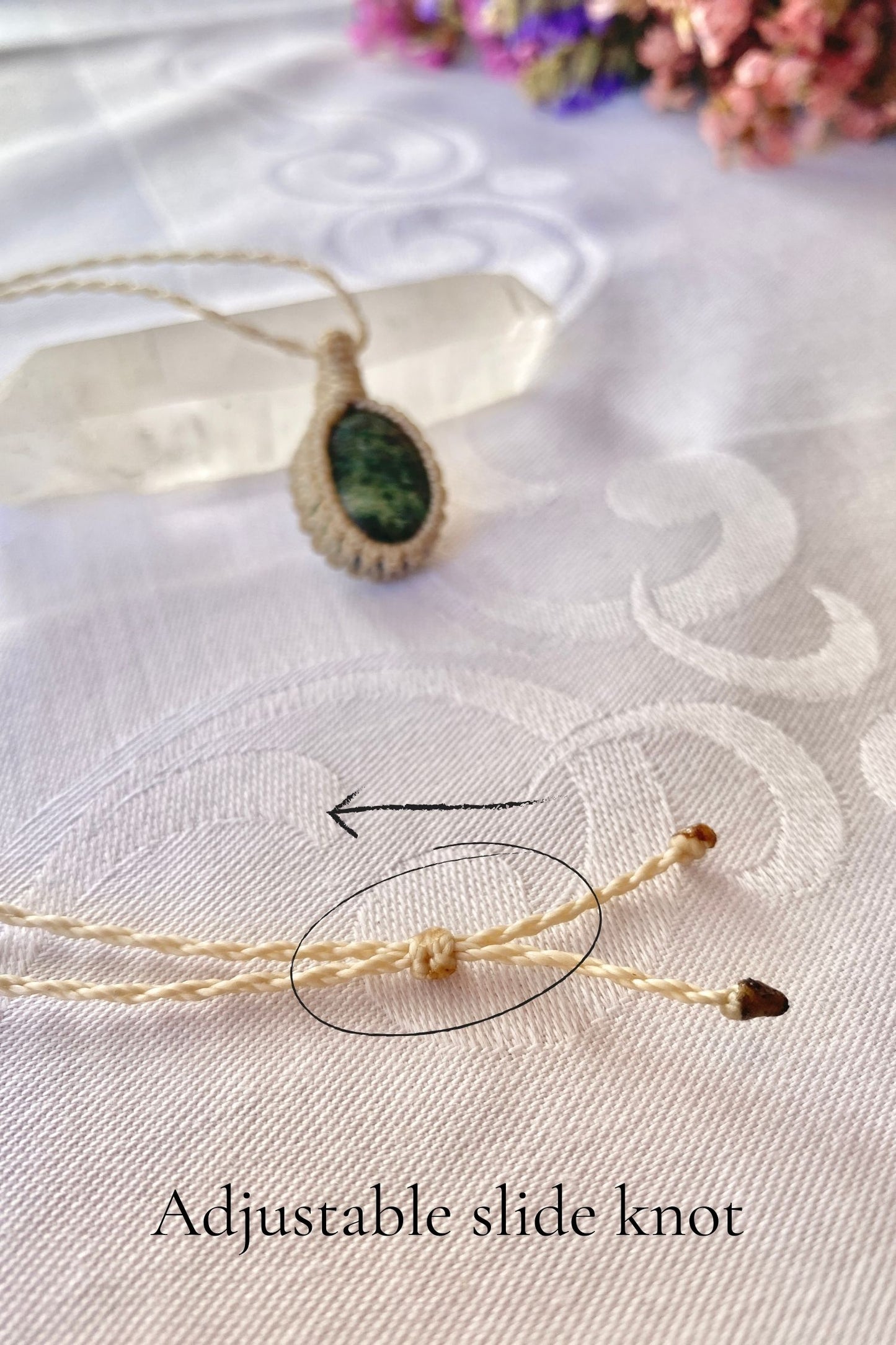 Close-up of the adjustable sliding knot on the Ruby Fuchsite Macrame necklace, allowing for an easy and customizable fit for any wearer.