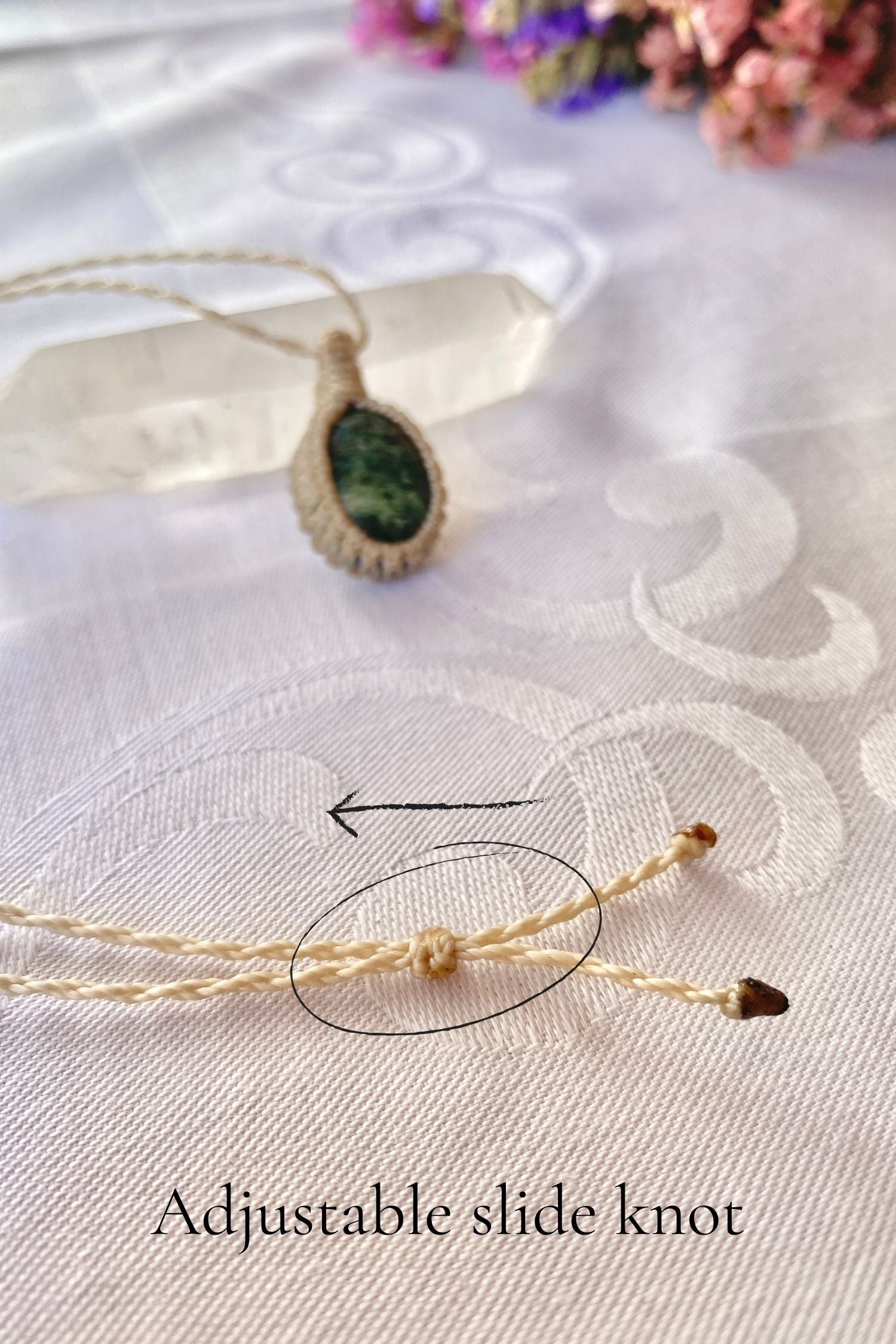 Close-up of the adjustable sliding knot on the Ruby Fuchsite Macrame necklace, allowing for an easy and customizable fit for any wearer.
