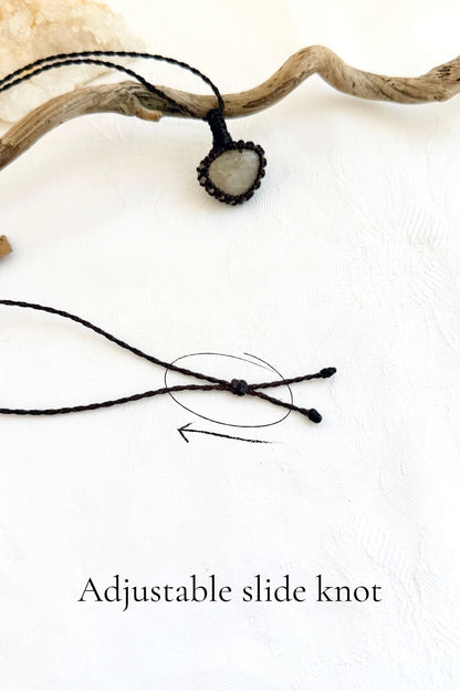 Handmade Rutilated Quartz macramé necklace with adjustable slide knot, versatile necklace sizing