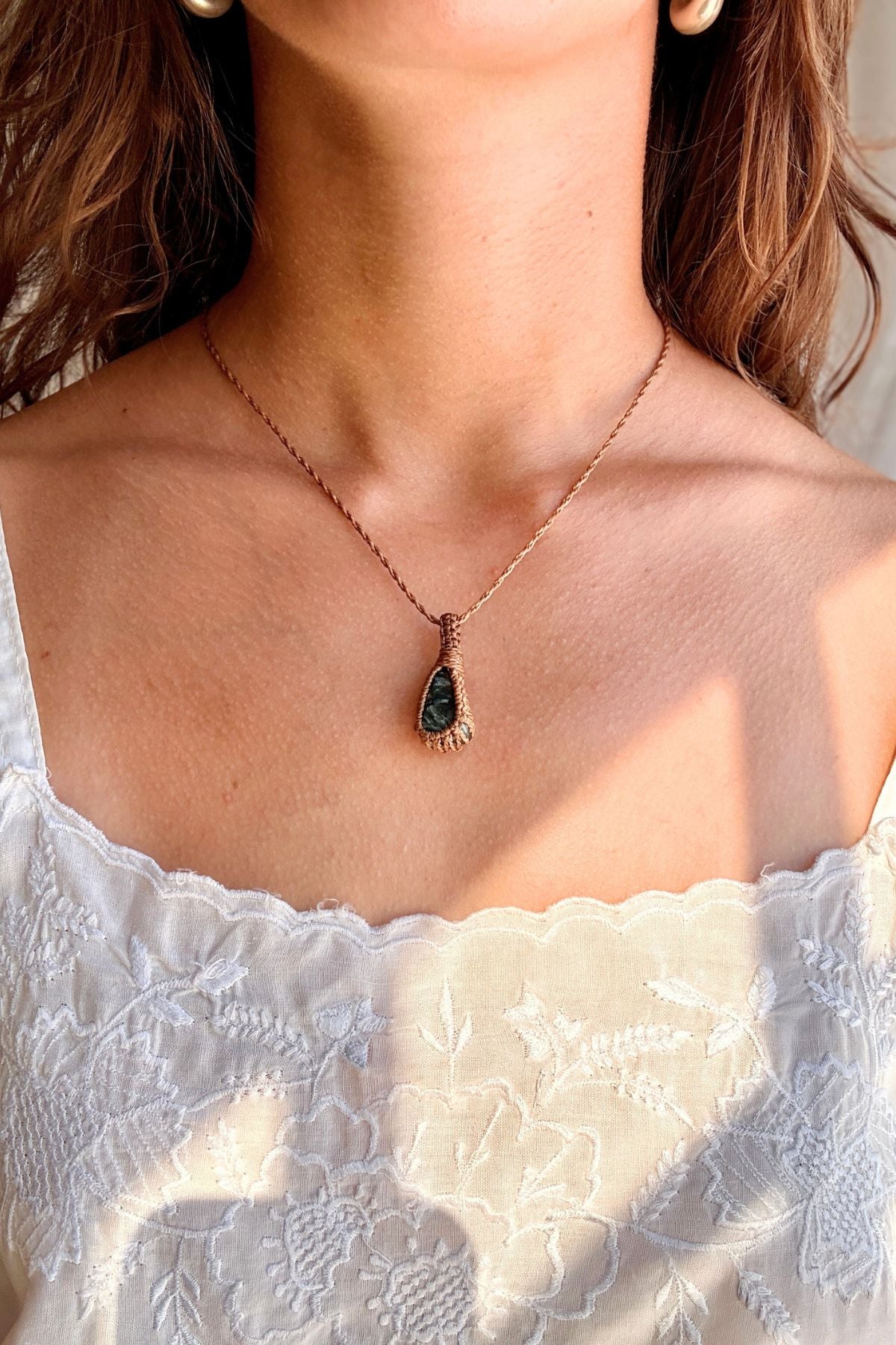 Model wearing a handmade Seraphinite macramé necklace, delicate everyday jewelry