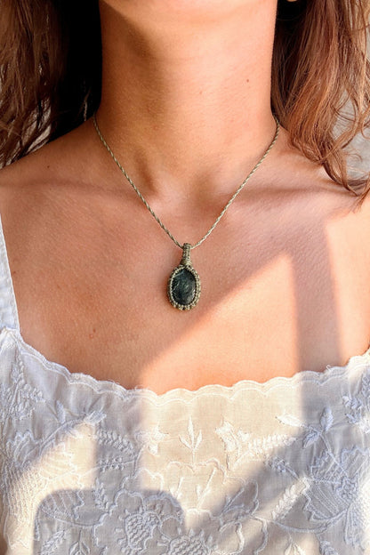Model wearing a handmade Seraphinite macramé necklace, delicate everyday jewelry