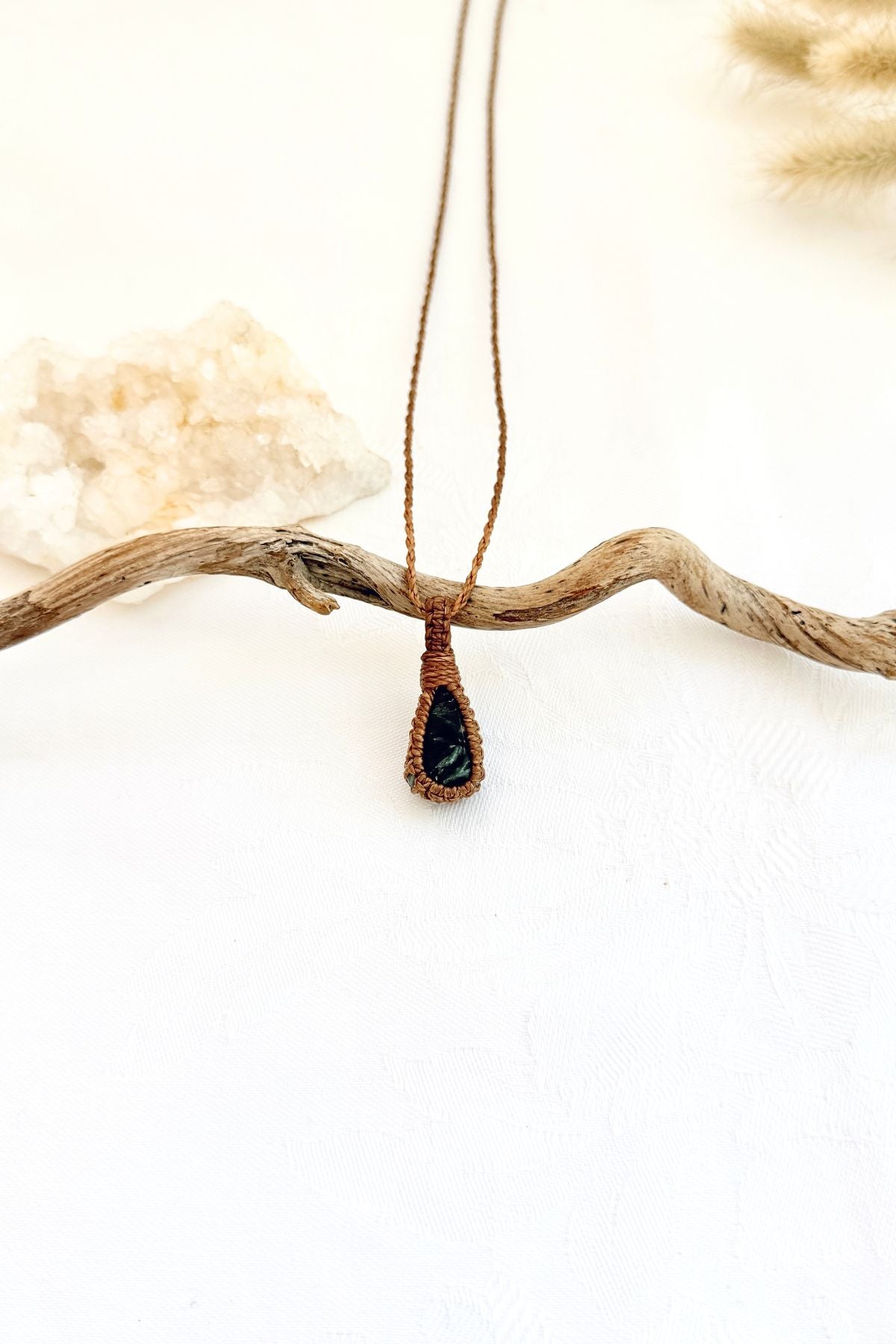Handmade Seraphinite macramé necklace, front view of natural gemstone pendant