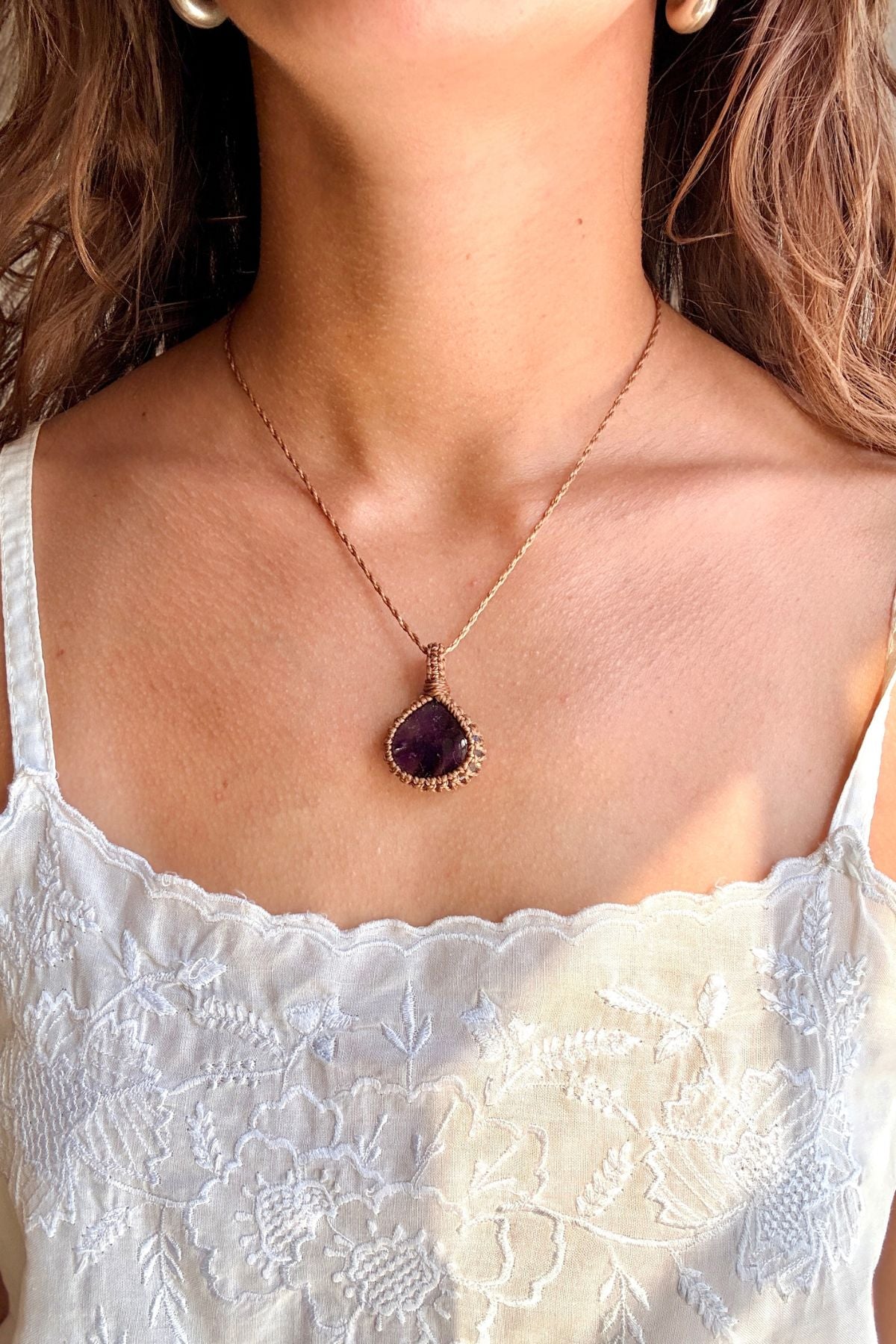 Model wearing a handmade Star Amethyst macramé necklace, delicate everyday jewelry