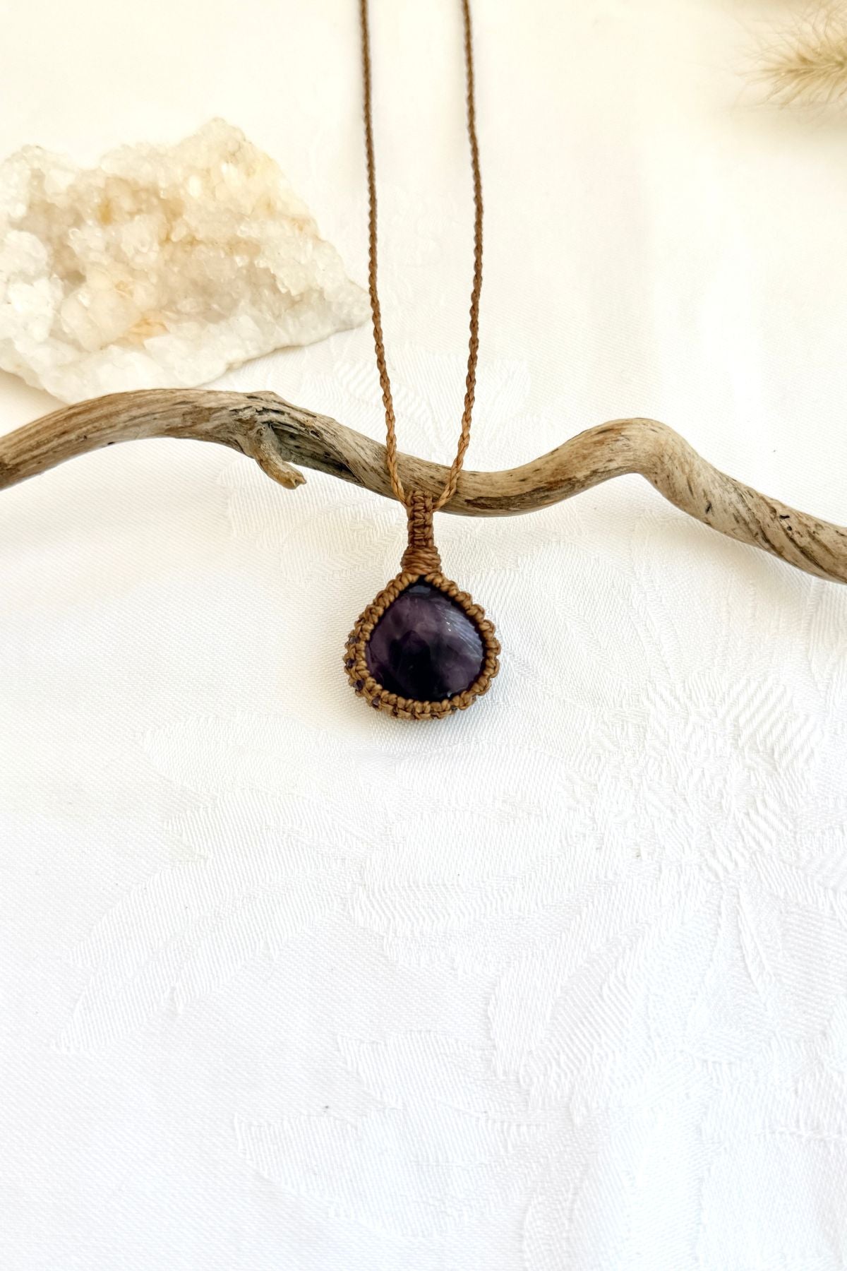 Handmade Star Amethyst macramé necklace, front view of natural gemstone pendant