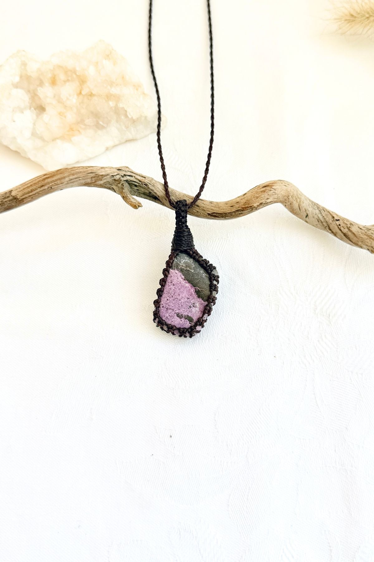 Handmade Stichtite macramé necklace, front view of natural gemstone pendant