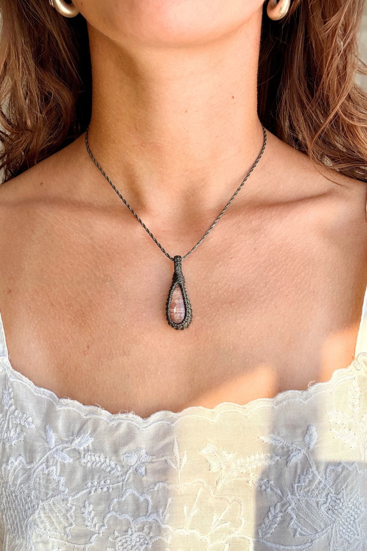 Model wearing a handmade Sunstone macramé necklace, delicate everyday jewelry