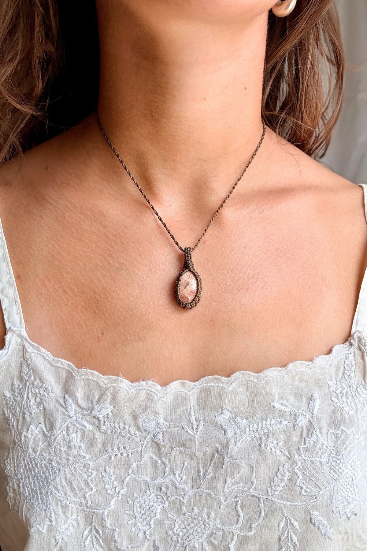 Model wearing a handmade Sunstone macramé necklace, delicate everyday jewelry