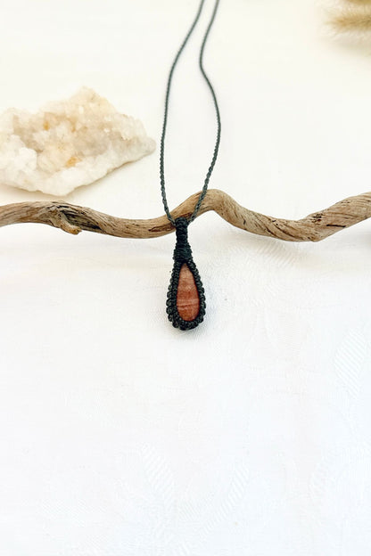Handmade Sunstone macramé necklace, front view of natural gemstone pendant