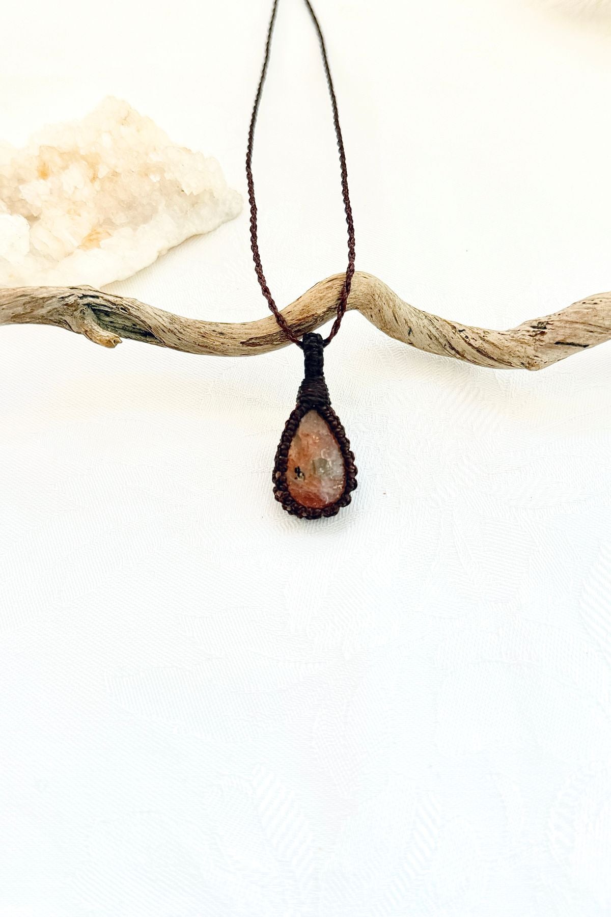 Handmade Sunstone macramé necklace, front view of natural gemstone pendant