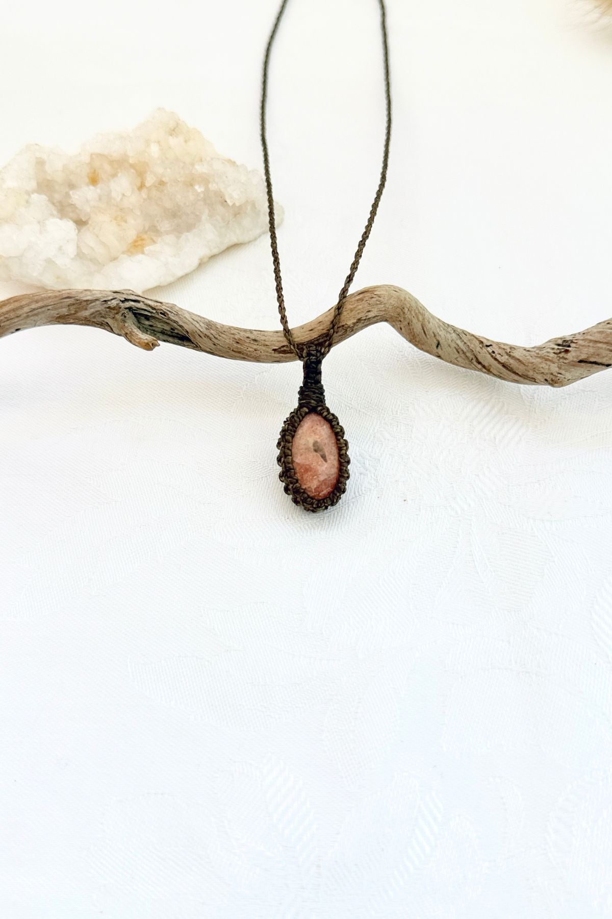 Handmade Sunstone macramé necklace, front view of natural gemstone pendant