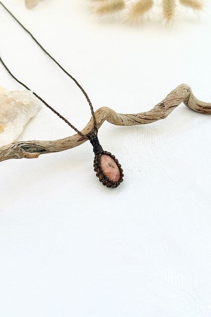 Handmade Sunstone macramé necklace, side view showing the gemstone and macramé knotting