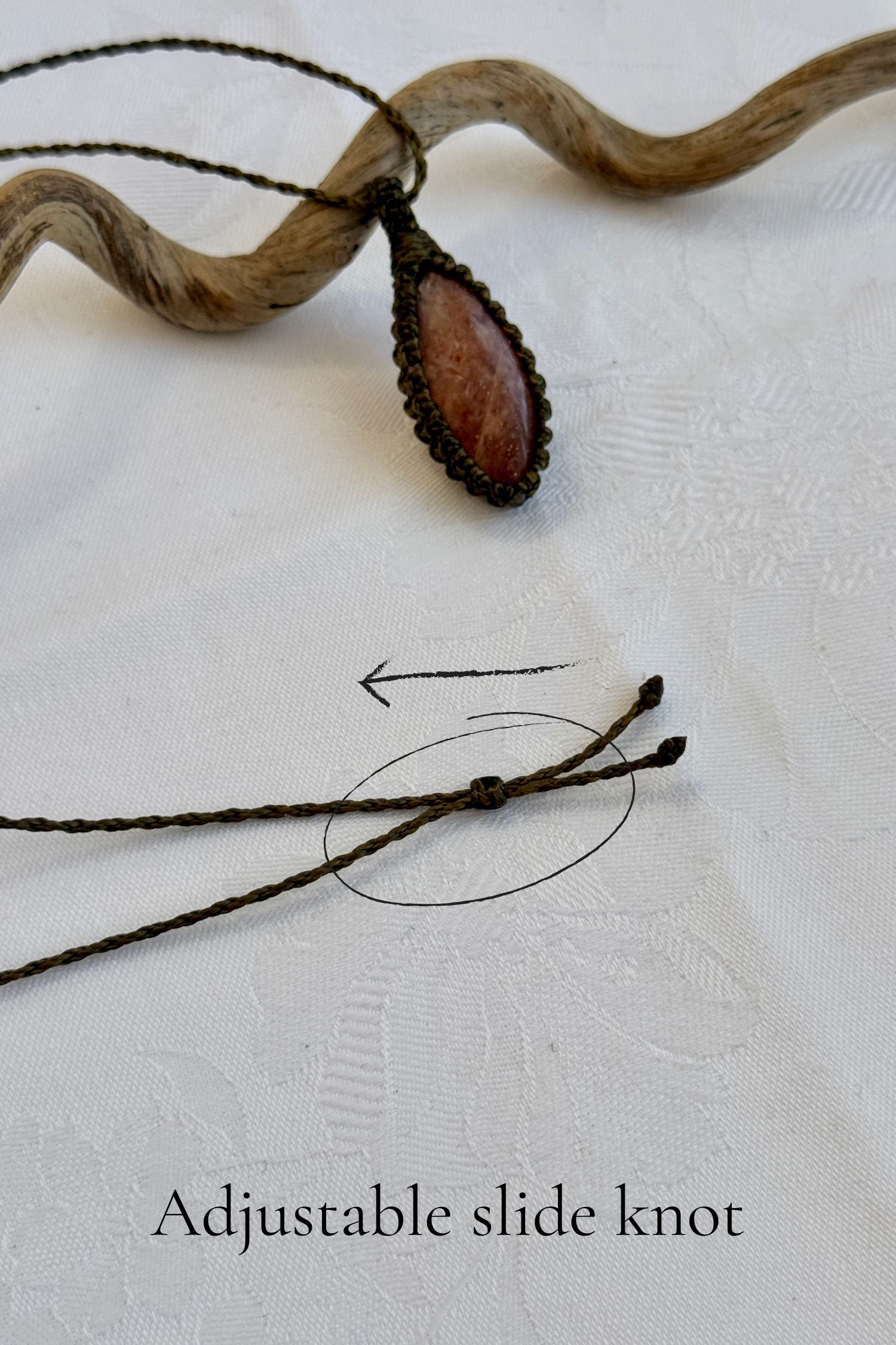 Close-up of the adjustable sliding knot on the Sunstone Macrame necklace, allowing for an easy and customizable fit for any wearer.