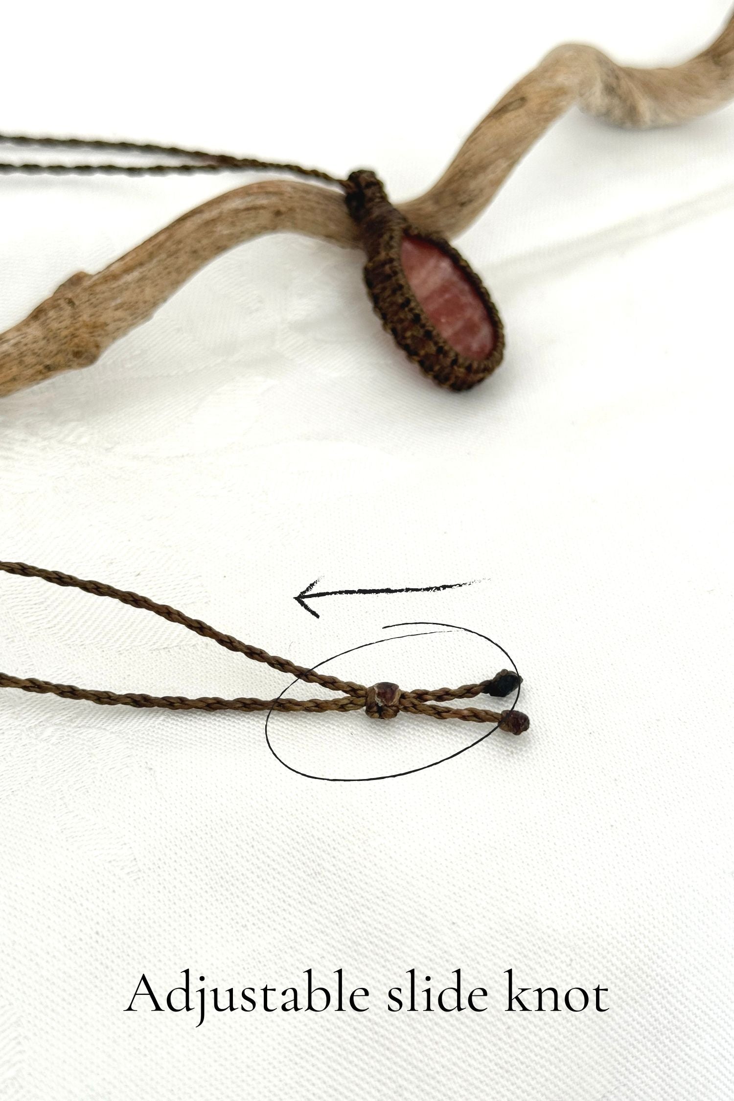 Close-up of the adjustable sliding lock on a handmade Sunstone macrame necklace, ensuring a perfect fit for all sizes.