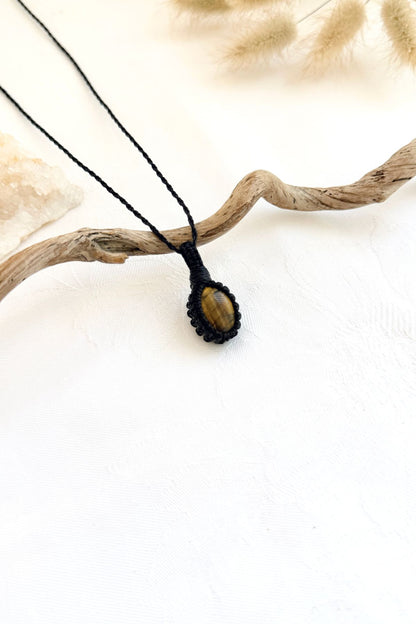 Handmade Tiger’s Eye macramé necklace, side view showing the gemstone and macramé knotting