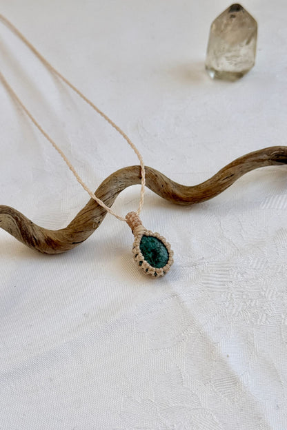 Another side angle shot of the handmade Turquoise Macrame necklace, emphasizing the elegant craftsmanship and natural gemstone colors.