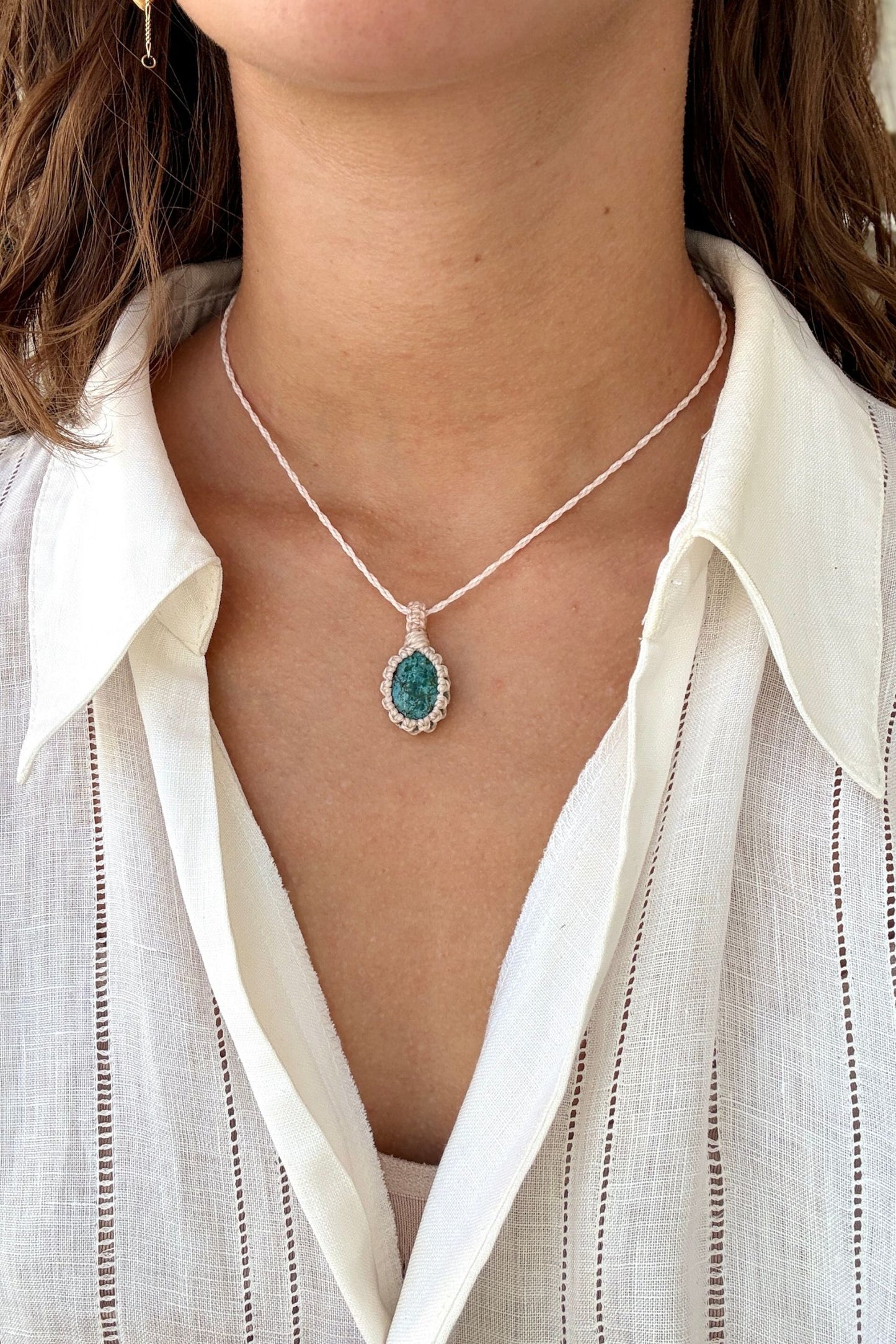 Model wearing a delicate handmade Turquoise macrame necklace with a white cord, perfect for everyday wear.
