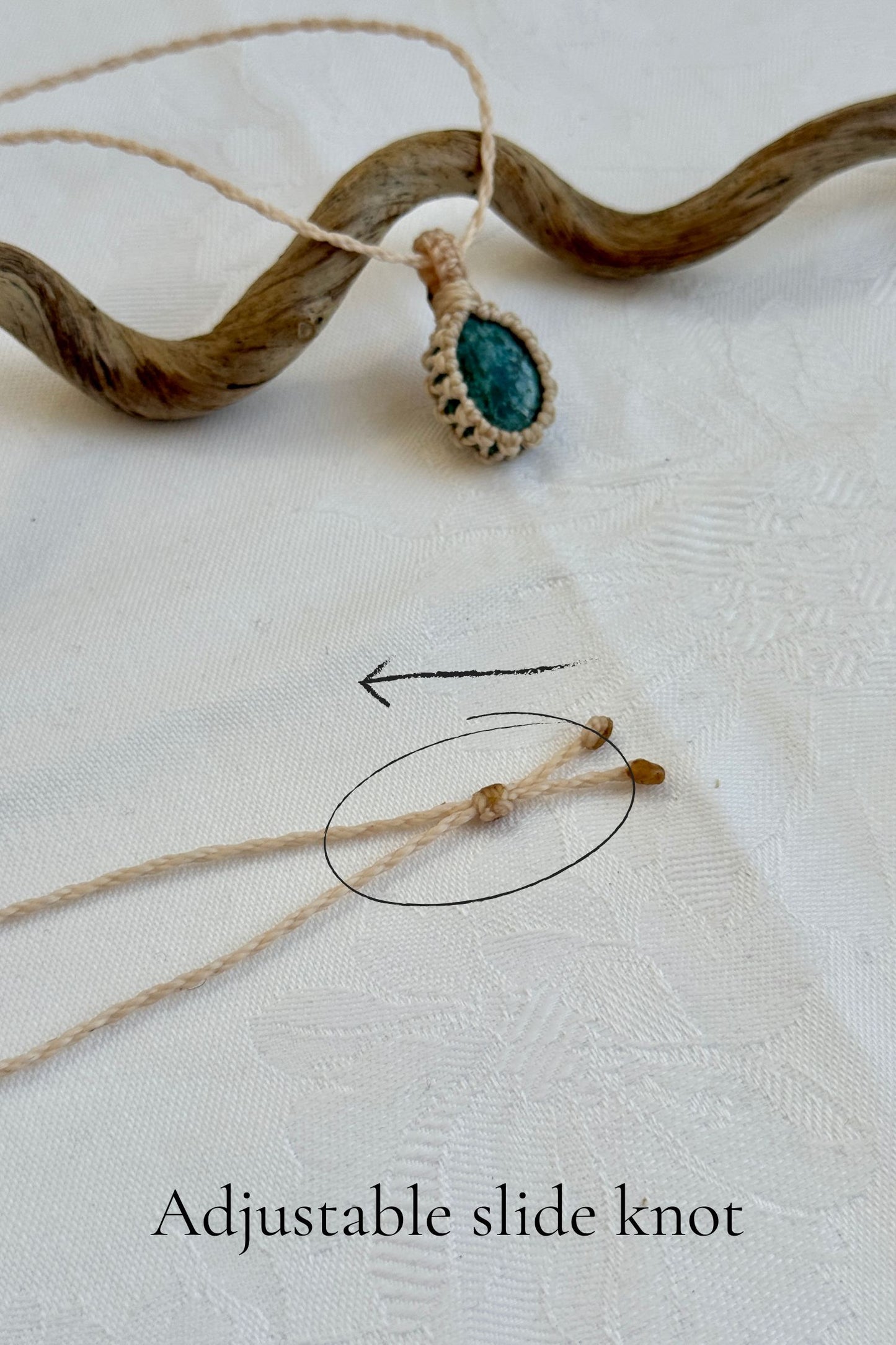 Close-up of the adjustable sliding knot on the Turquoise Macrame necklace, allowing for an easy and customizable fit for any wearer.