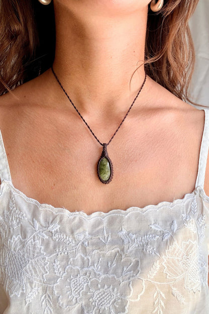 Model wearing a handmade Vesuvianite macramé necklace, delicate everyday jewelry