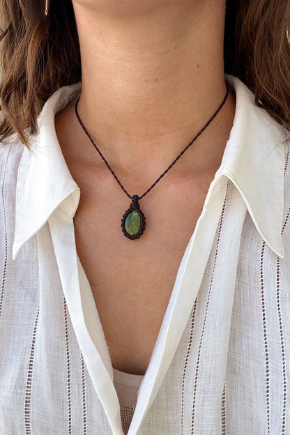 Model wearing a delicate handmade Vesuvianite macrame necklace with a brown cord, perfect for everyday wear.